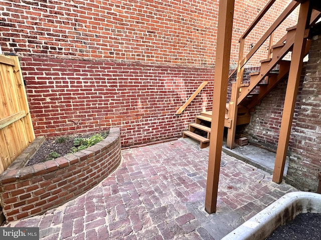 view of patio / terrace with stairway