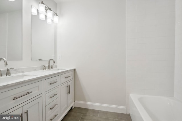 bathroom with vanity and tile patterned floors