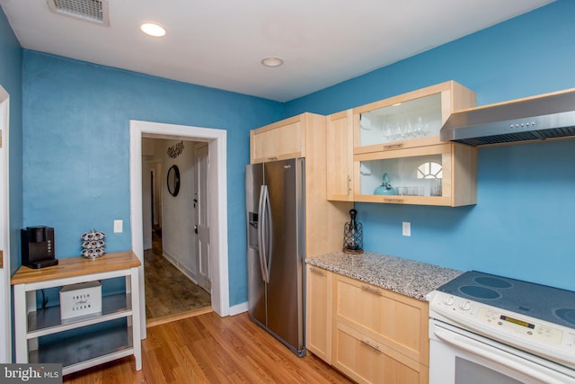 57 N Franklin St, Lambertville, NJ 08530 - kitchen with light brown cabinetry, white range with electric cooktop, stainless steel fridge with ice dispenser, light wood-type flooring, and visible vents
