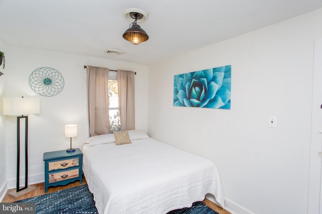 57 N Franklin St, Lambertville, NJ 08530 - bedroom featuring baseboards, visible vents, and wood finished floors
