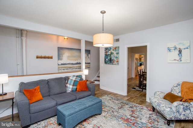 57 N Franklin St, Lambertville, NJ 08530 - living area featuring stairs, baseboards, visible vents, and wood finished floors
