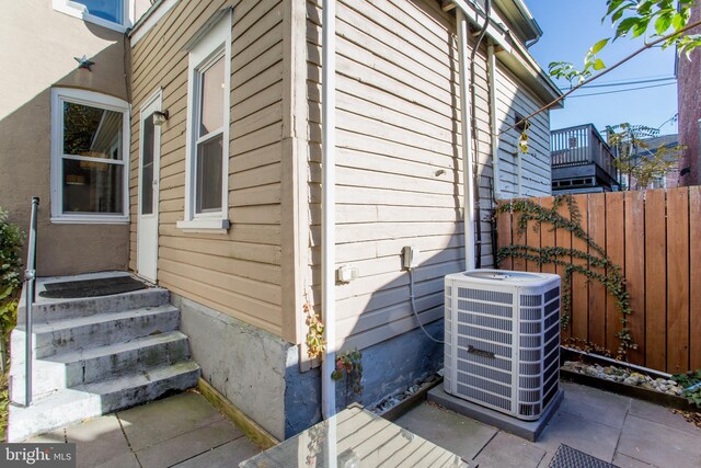 57 N Franklin St, Lambertville, NJ 08530 - view of property exterior with fence and central AC