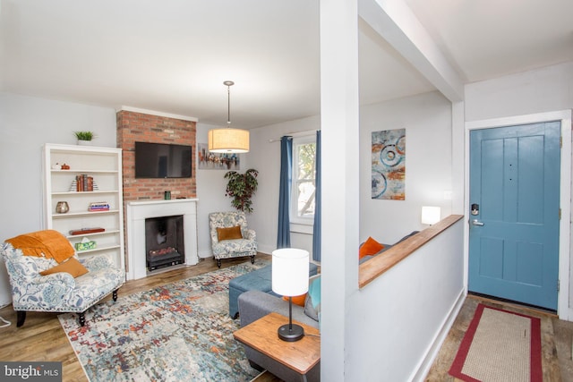 57 N Franklin St, Lambertville, NJ 08530 - living room featuring baseboards, wood finished floors, and a fireplace
