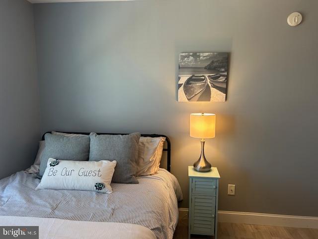 bedroom featuring hardwood / wood-style floors