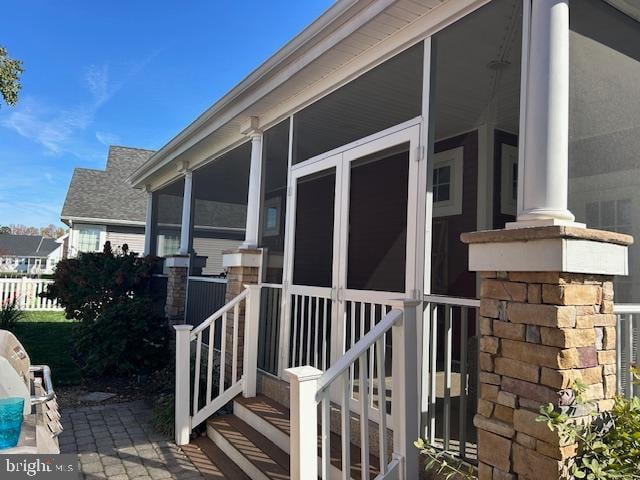 view of home's exterior featuring a sunroom