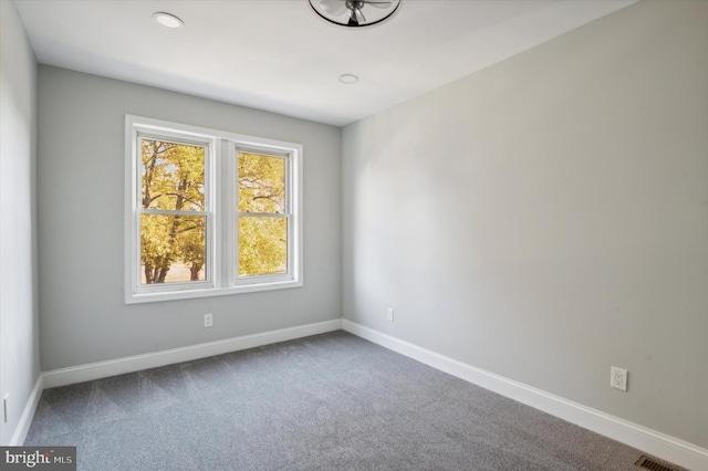 view of carpeted spare room