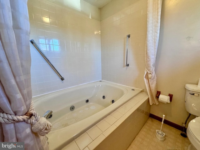 bathroom featuring toilet, shower / bath combo with shower curtain, and tile patterned floors