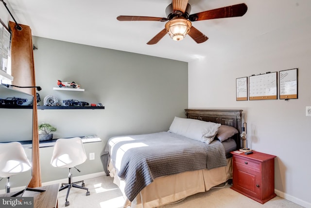 bedroom featuring light carpet and ceiling fan