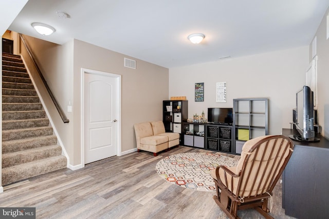 living area featuring light hardwood / wood-style floors