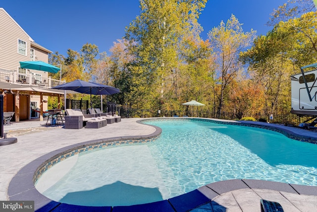 view of pool with an outdoor hangout area and a patio