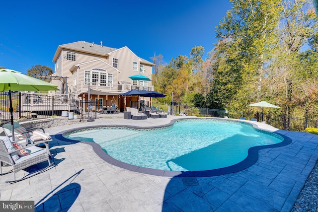 view of pool featuring a patio area