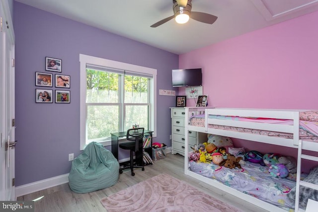 bedroom featuring light hardwood / wood-style flooring and ceiling fan