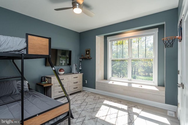 bedroom featuring ceiling fan and light wood-type flooring