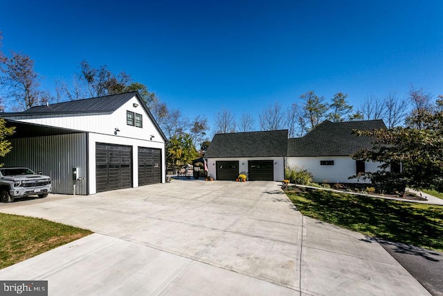 view of side of property featuring a garage