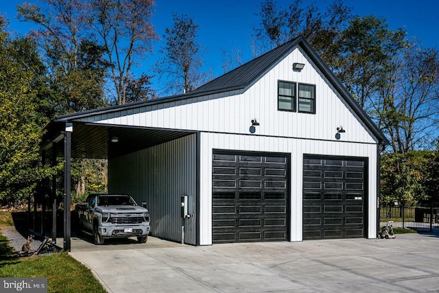 garage featuring a carport