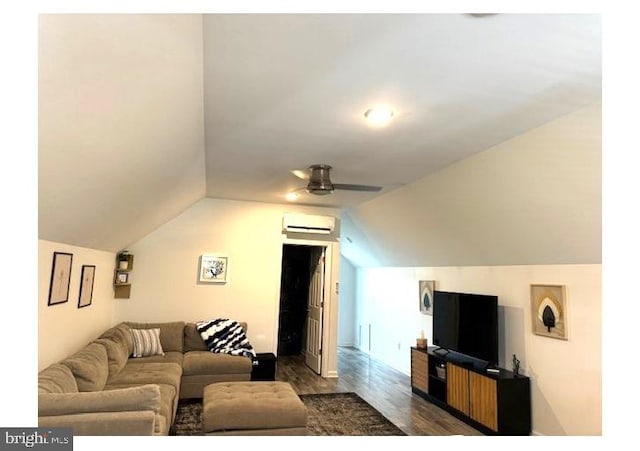 living room featuring vaulted ceiling, ceiling fan, a wall mounted air conditioner, and dark hardwood / wood-style flooring