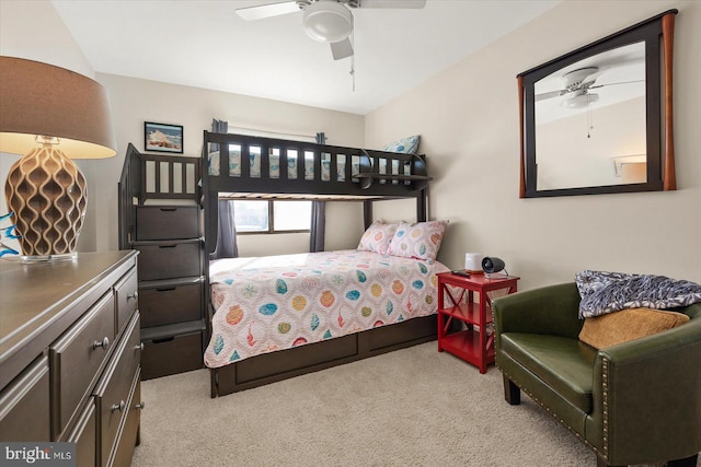 bedroom featuring ceiling fan and light carpet