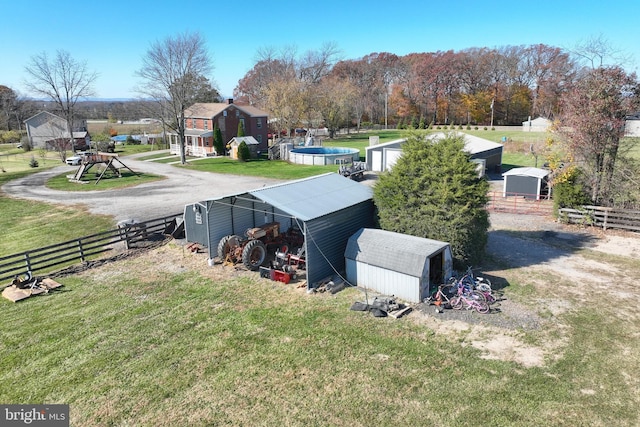 view of yard featuring a storage unit