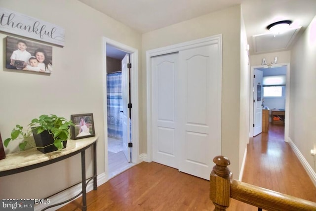 144 Sams Rd, Jackson, NJ 08527 - hallway featuring attic access, baseboards, and wood finished floors