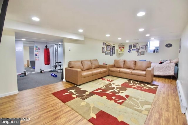 144 Sams Rd, Jackson, NJ 08527 - living area featuring wood finished floors, baseboards, a baseboard heating unit, and recessed lighting