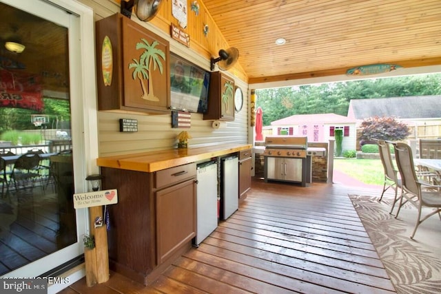 view of patio featuring a deck and grilling area