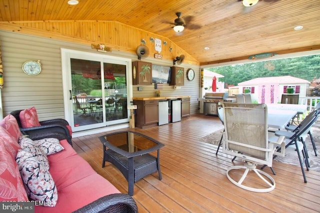 144 Sams Rd, Jackson, NJ 08527 - wooden deck with outdoor dining area and a ceiling fan