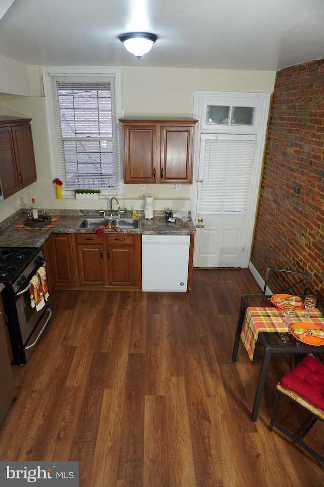 22 Parkin St, Baltimore, MD 21201 - kitchen with white dishwasher, brown cabinetry, a sink, dark wood-type flooring, and stainless steel range with gas stovetop