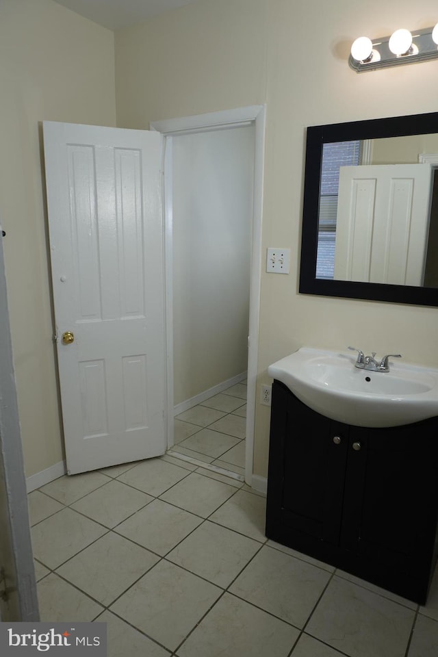 bathroom featuring vanity and tile patterned flooring