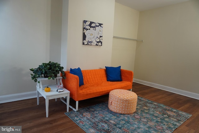 22 Parkin St, Baltimore, MD 21201 - living area with baseboards and wood finished floors