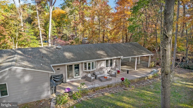 view of front of house with outdoor lounge area and a patio