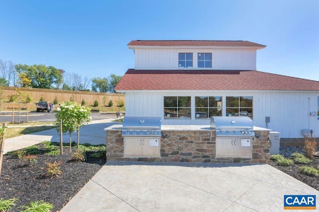 view of patio / terrace featuring grilling area and exterior kitchen