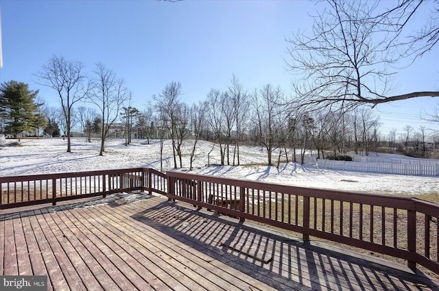 view of snow covered deck