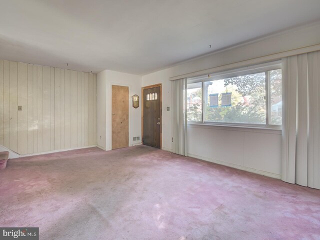 interior space with light colored carpet