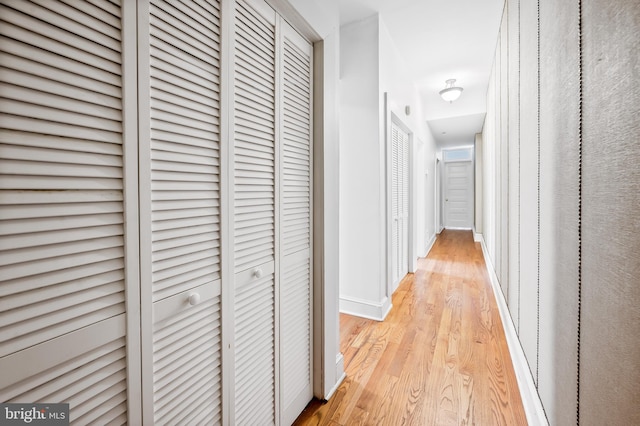 hallway featuring light wood-type flooring