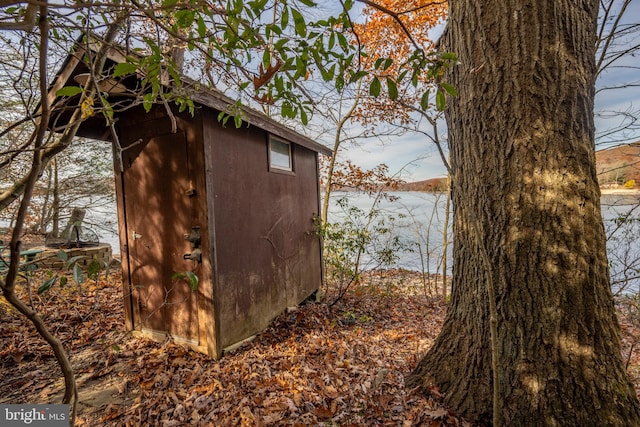 view of outdoor structure with a water view