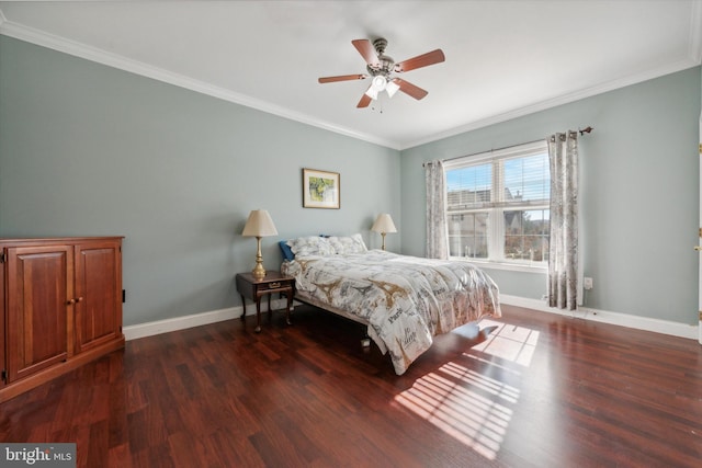 bedroom with ornamental molding, dark hardwood / wood-style floors, and ceiling fan