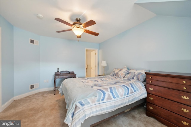 carpeted bedroom featuring lofted ceiling and ceiling fan