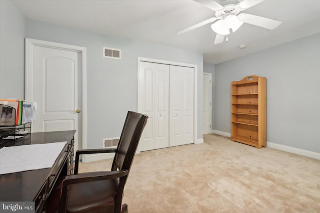 home office with light colored carpet and ceiling fan