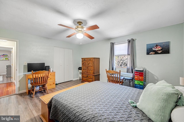 bedroom featuring hardwood / wood-style floors and ceiling fan