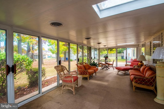 sunroom featuring a skylight