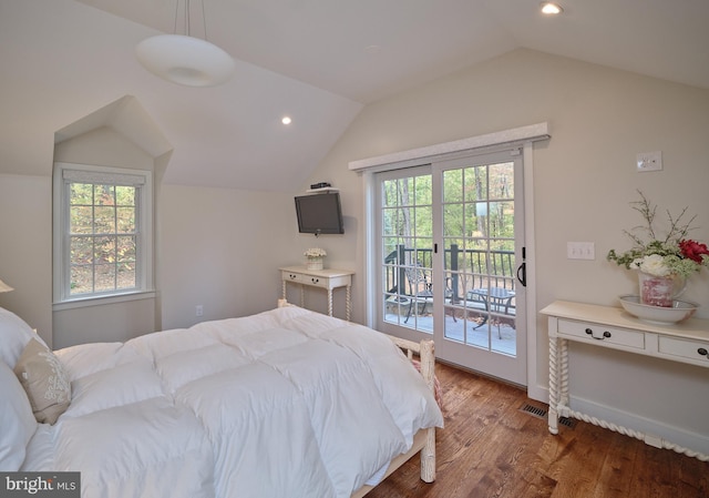 bedroom featuring access to exterior, vaulted ceiling, and dark hardwood / wood-style flooring