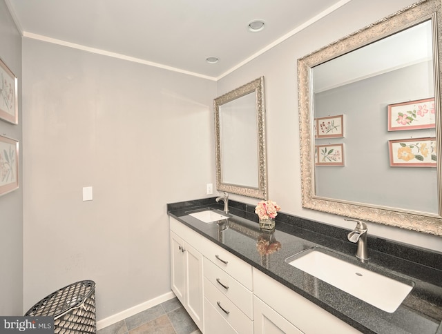 bathroom featuring vanity and ornamental molding