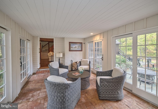 sunroom with wooden ceiling