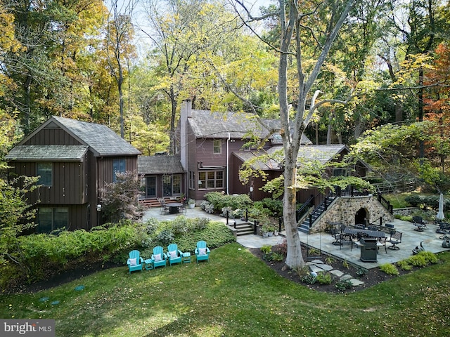 view of yard with an outdoor hangout area and a patio area