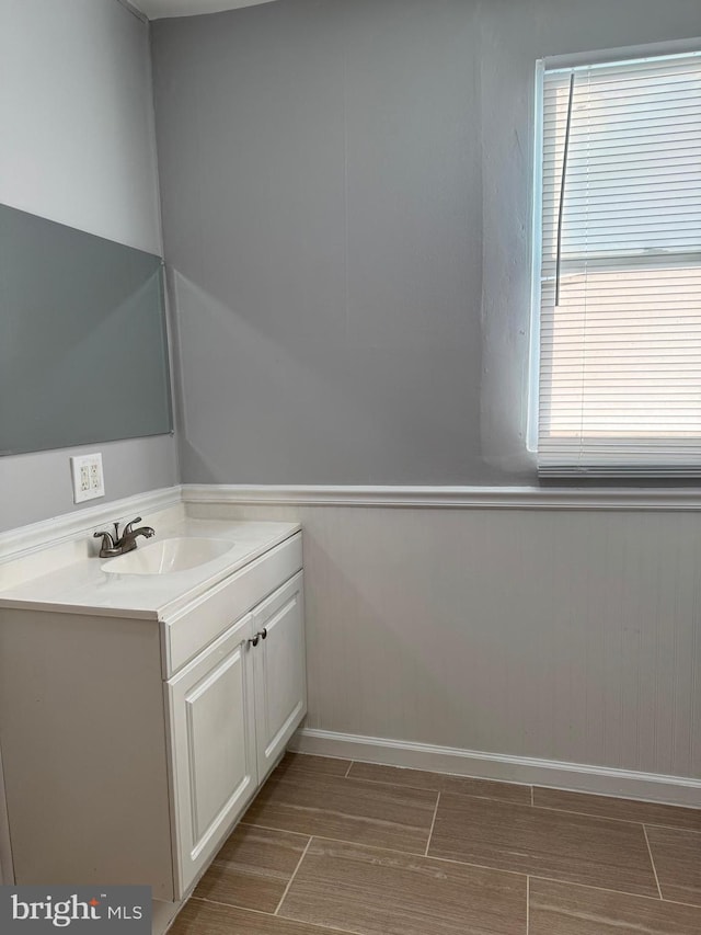 bathroom featuring vanity and plenty of natural light