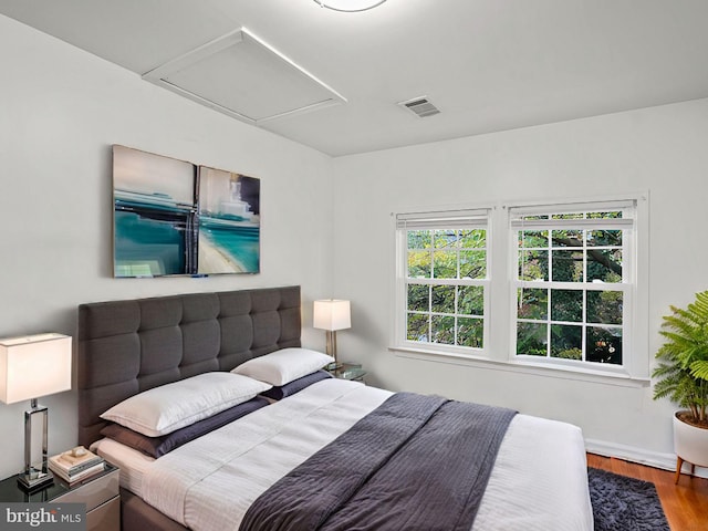 bedroom featuring hardwood / wood-style flooring