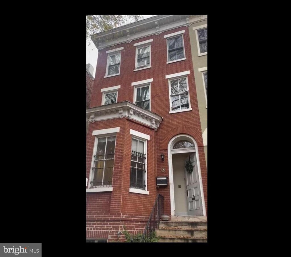 1415 Q St NW, Washington, DC 20009 - italianate house with brick siding