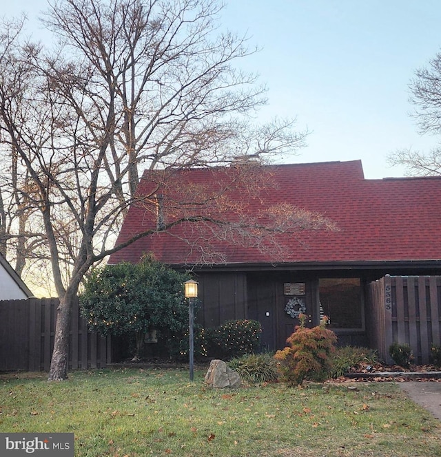 view of home's exterior featuring a lawn