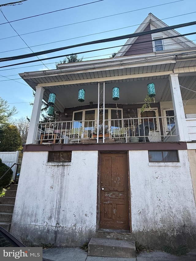 exterior space featuring covered porch