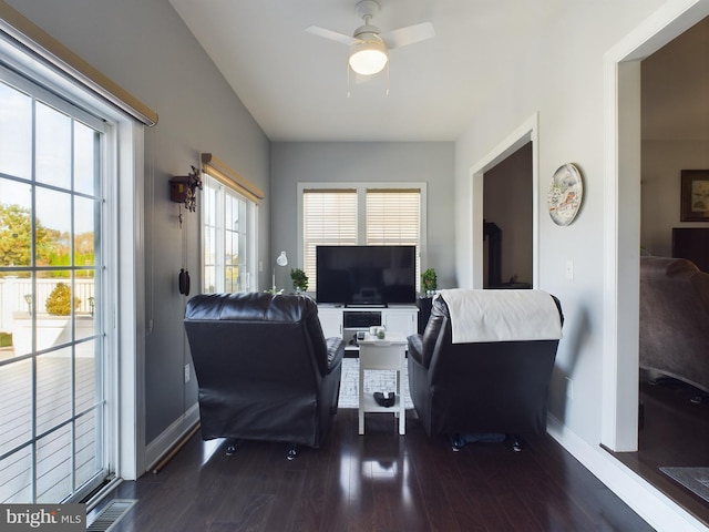 office area featuring dark hardwood / wood-style floors and ceiling fan